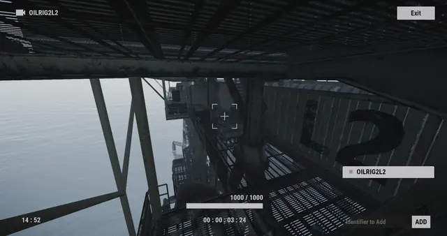 OILRIG2L2 camera, Large Oil Rig: a grated walkway beside a wall painted L2